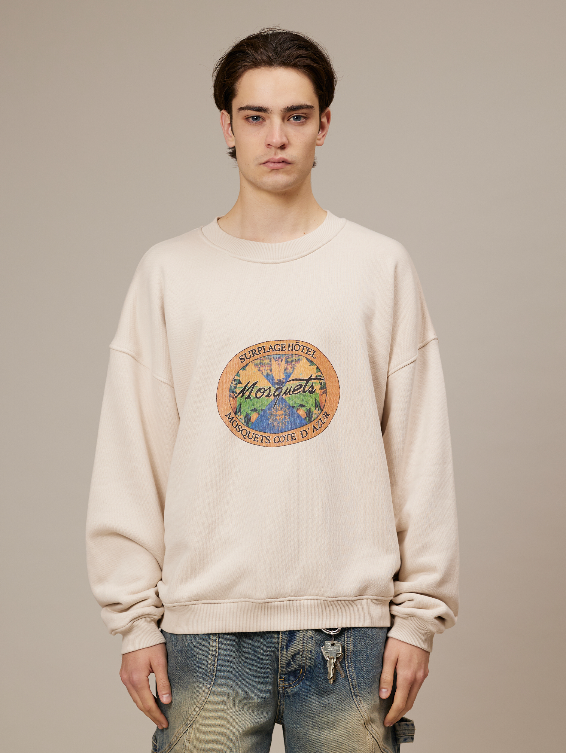 CREAM OVERSIZED SWEATSHIRT WITH OVAL GRAPHIC - ULTIMATE COMFORT