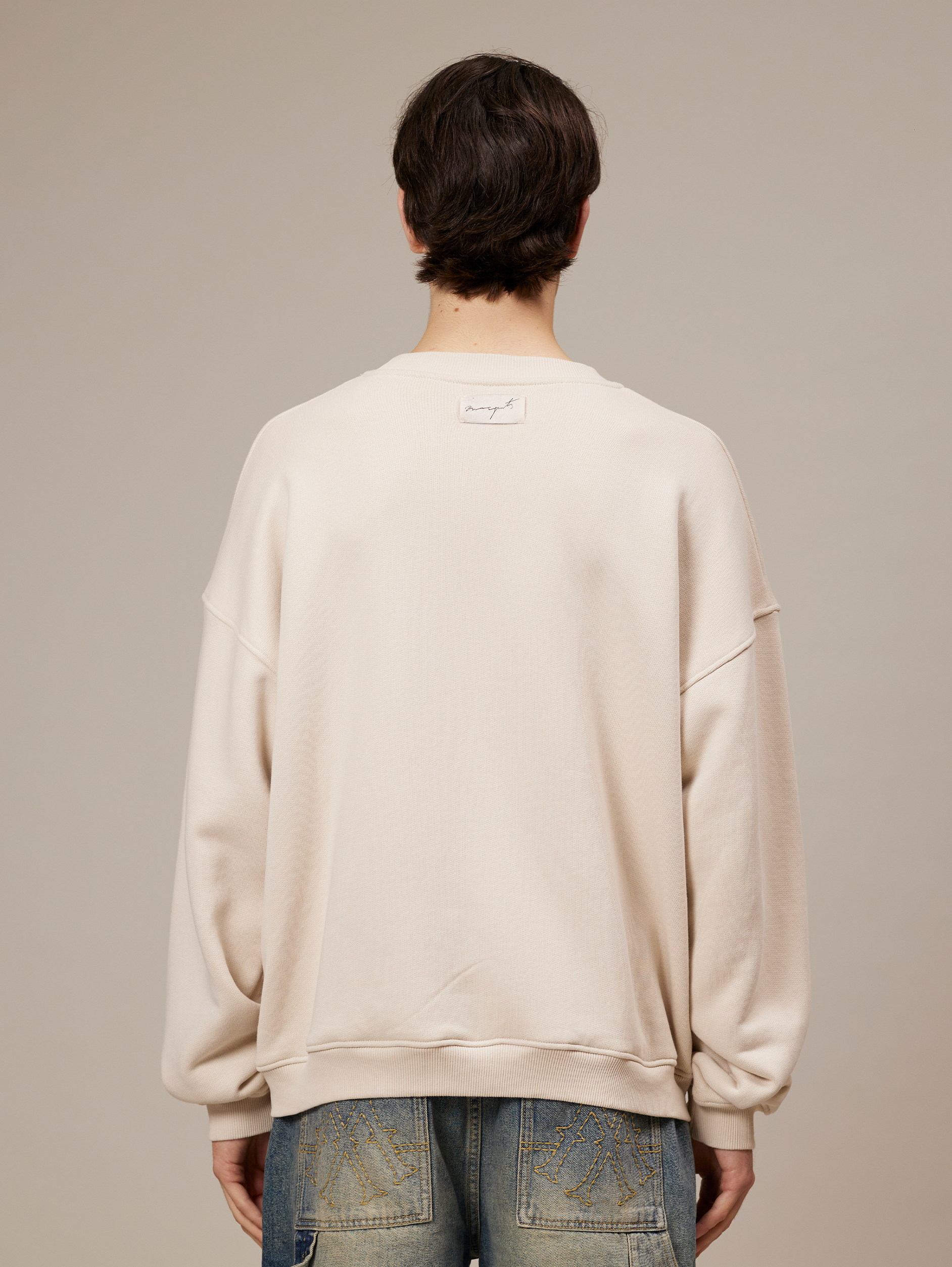 CREAM OVERSIZED SWEATSHIRT WITH OVAL GRAPHIC - ULTIMATE COMFORT