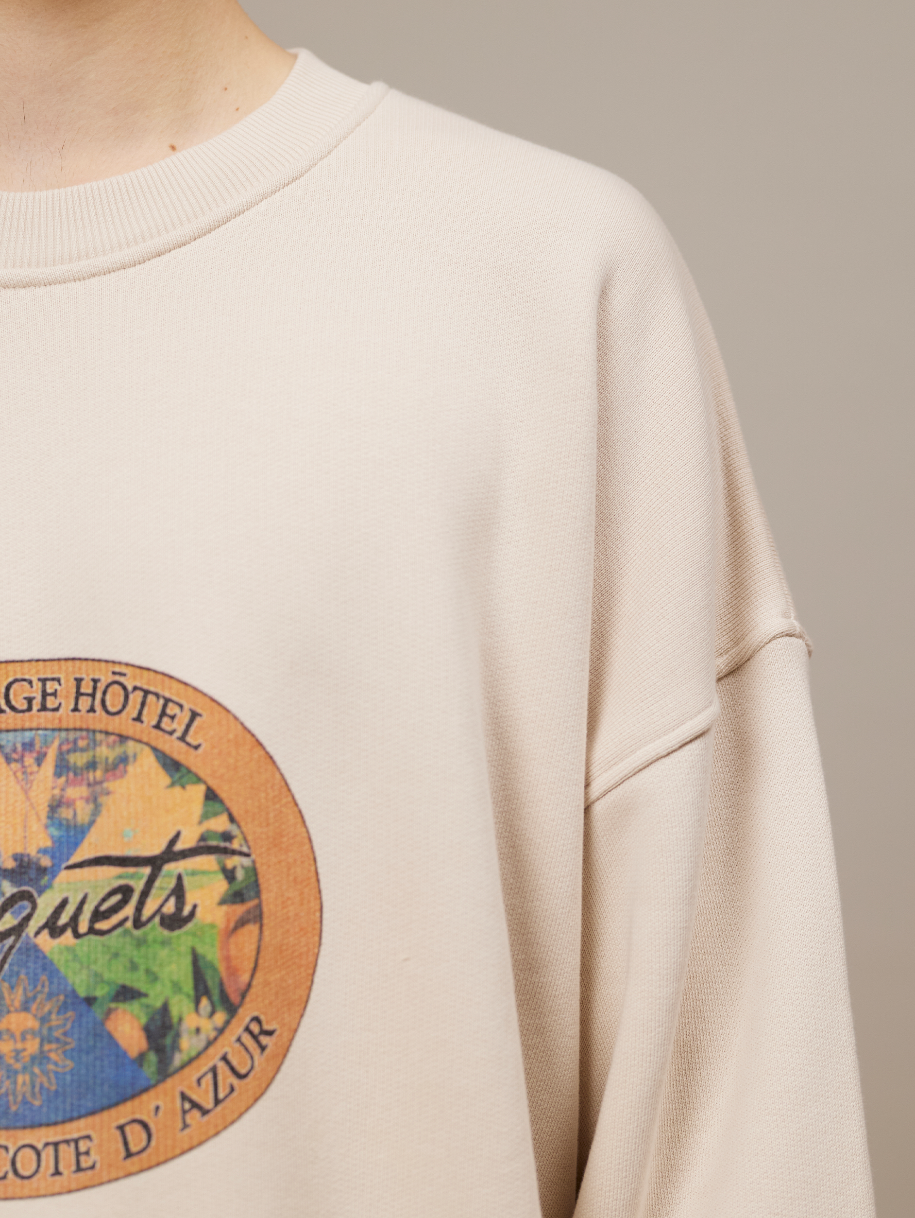CREAM OVERSIZED SWEATSHIRT WITH OVAL GRAPHIC - ULTIMATE COMFORT