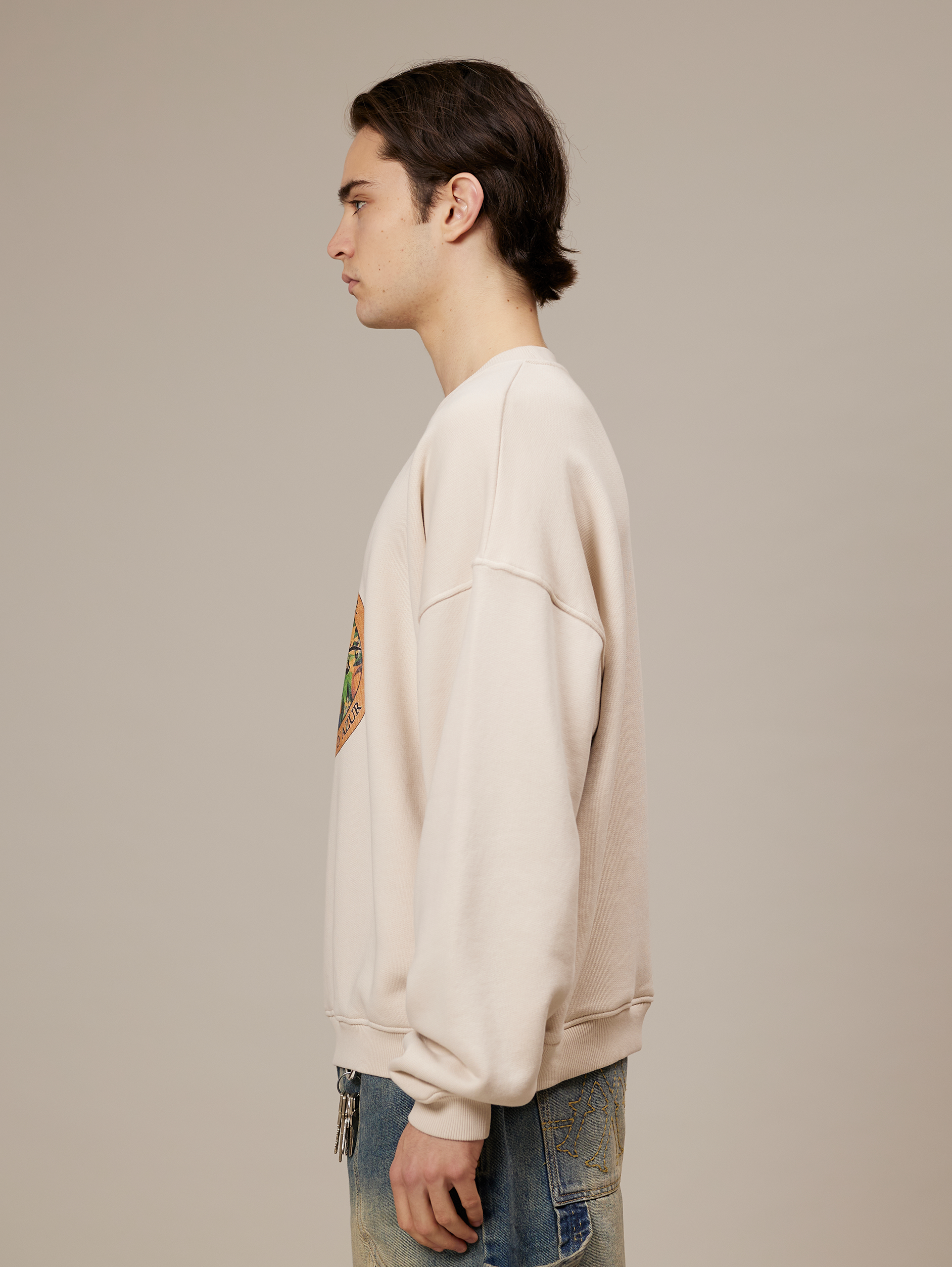 CREAM OVERSIZED SWEATSHIRT WITH OVAL GRAPHIC - ULTIMATE COMFORT