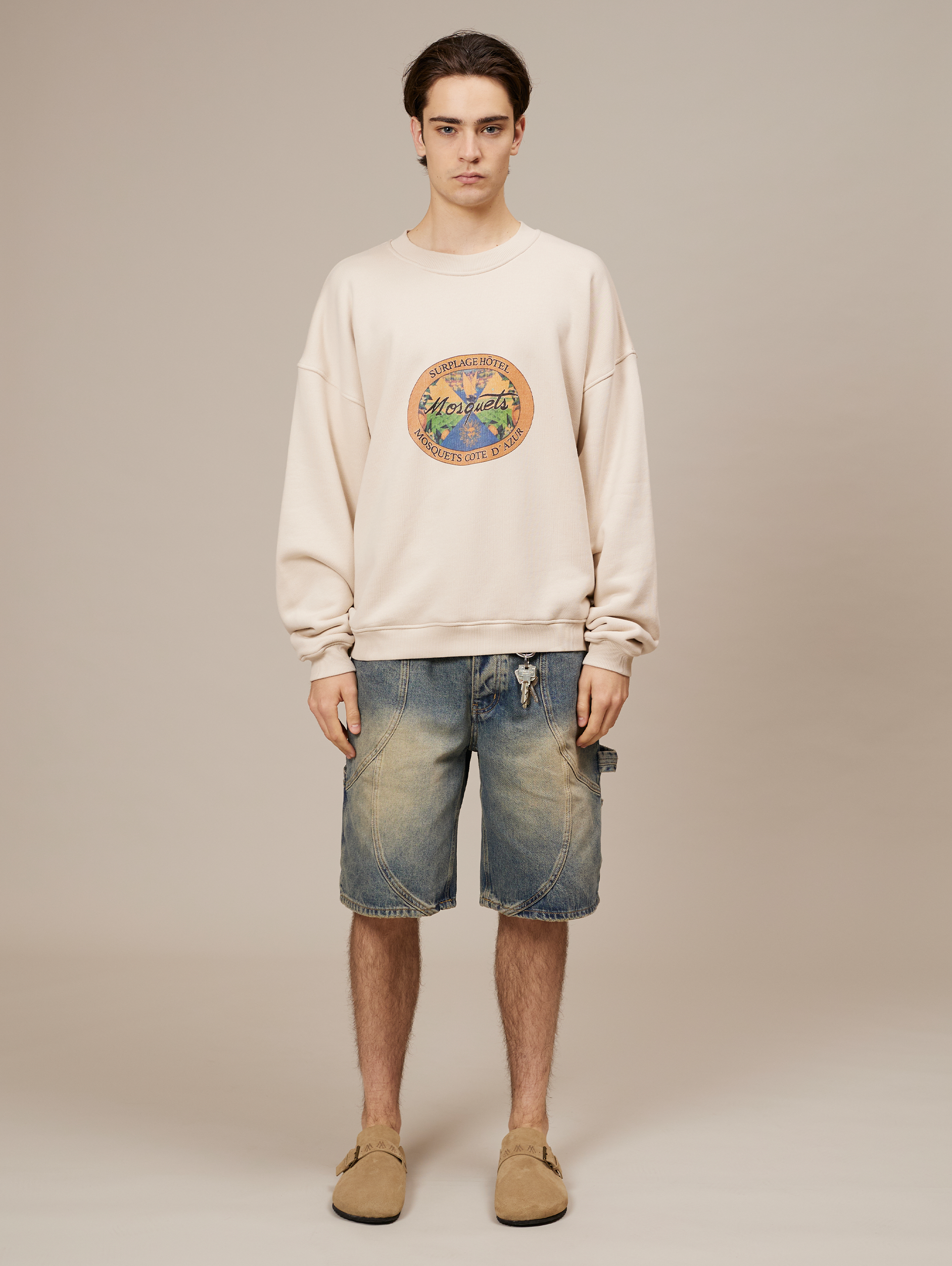 CREAM OVERSIZED SWEATSHIRT WITH OVAL GRAPHIC - ULTIMATE COMFORT