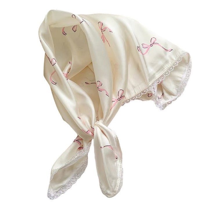 CREAM SILK SCARF WITH PINK BOW PATTERN AND LACE TRIM