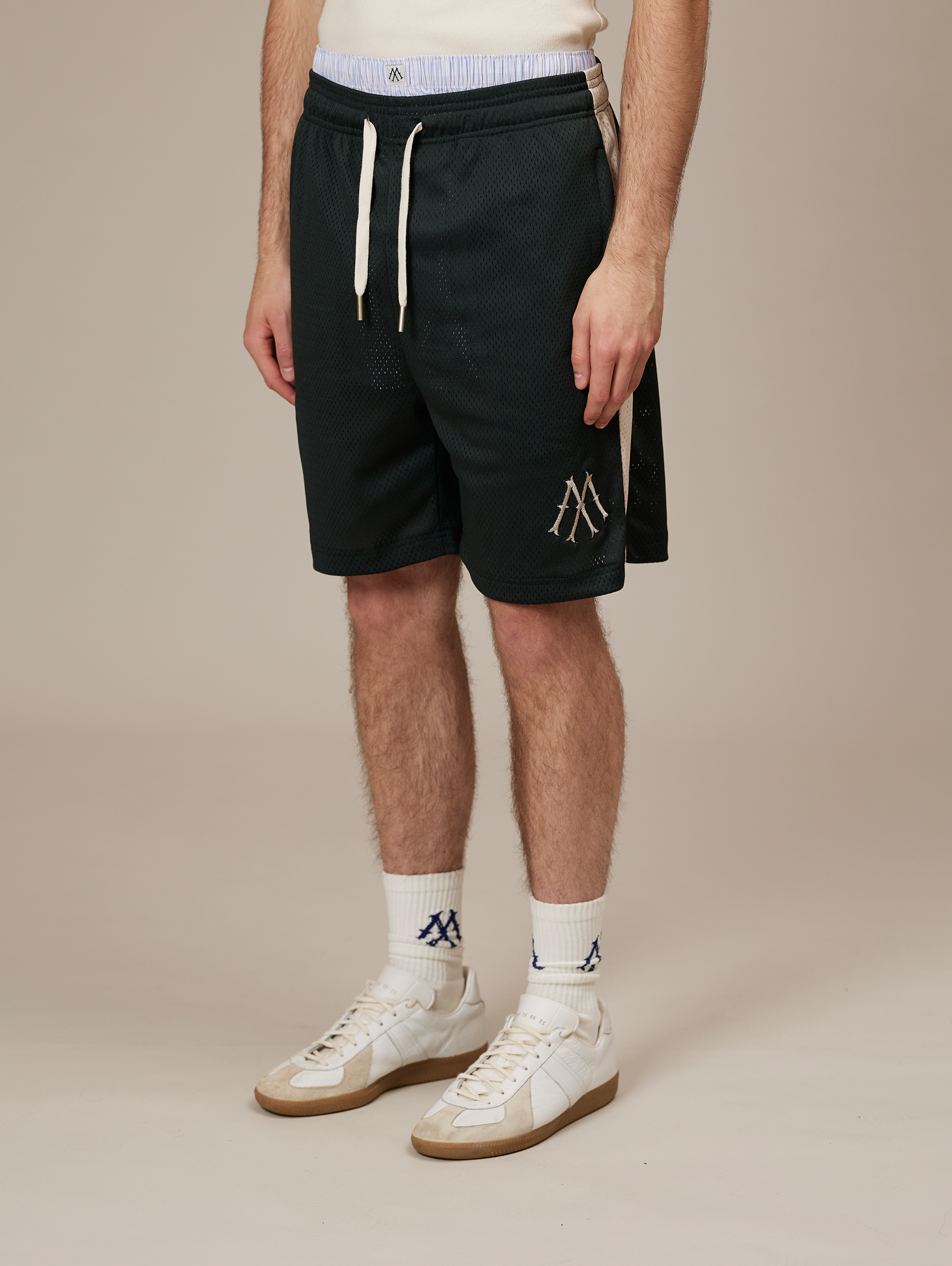 DARK GREEN ATHLETIC SHORTS WITH CREAM STRIPE FOR LUXURY STREETWEAR