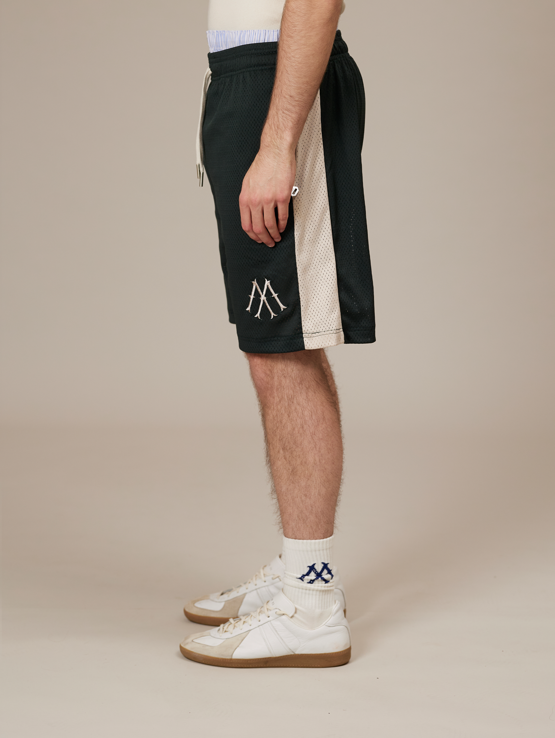 DARK GREEN ATHLETIC SHORTS WITH CREAM STRIPE FOR LUXURY STREETWEAR
