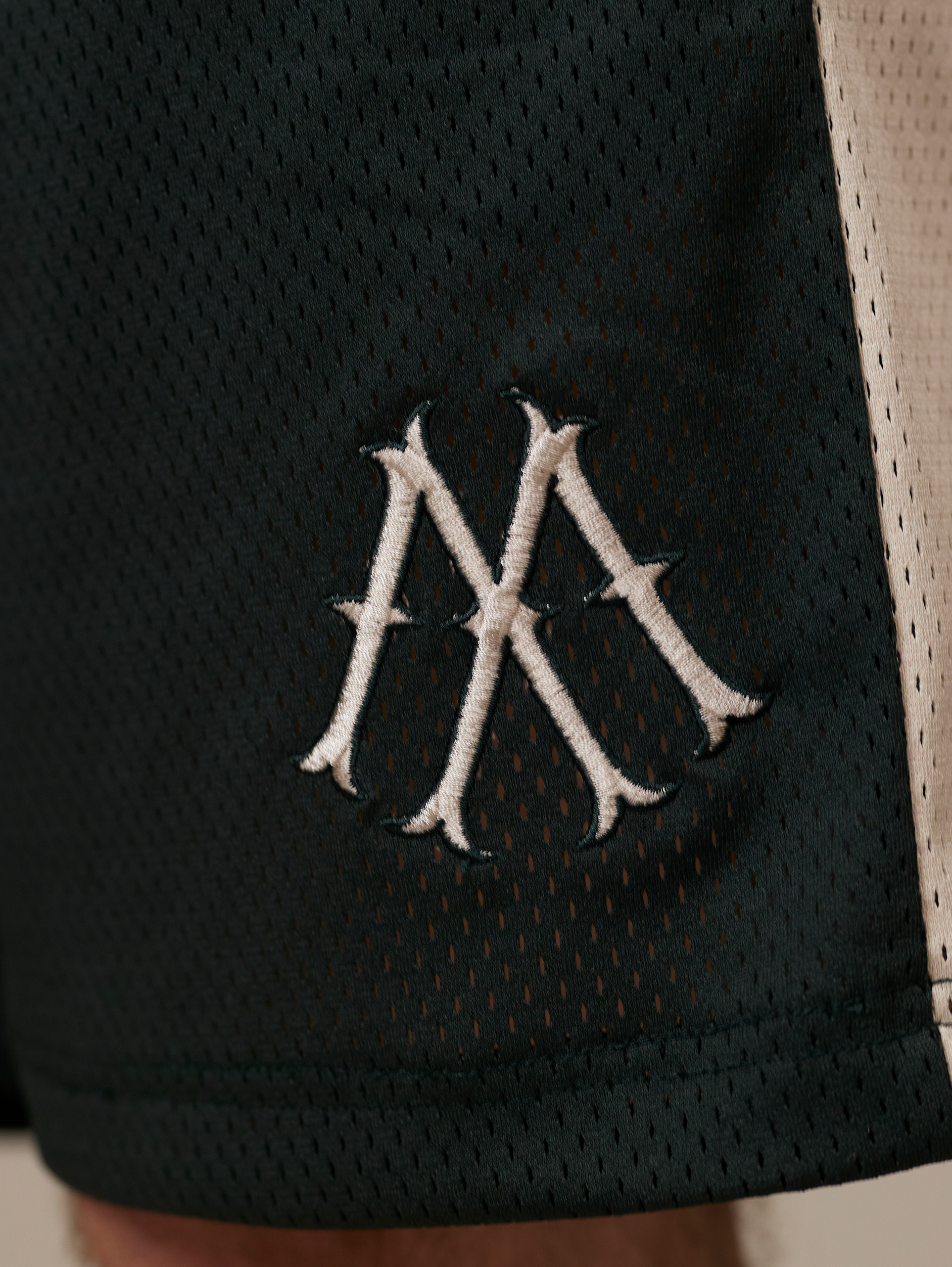 DARK GREEN ATHLETIC SHORTS WITH CREAM STRIPE FOR LUXURY STREETWEAR