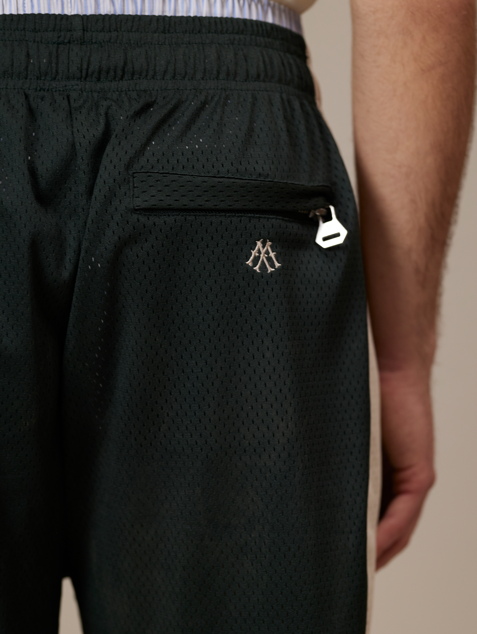 DARK GREEN ATHLETIC SHORTS WITH CREAM STRIPE FOR LUXURY STREETWEAR