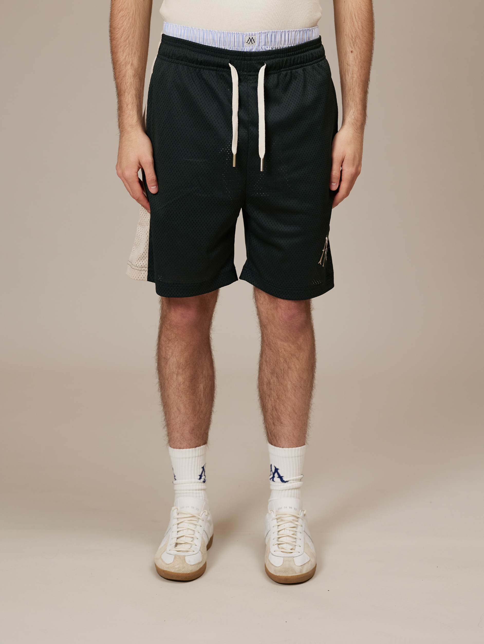 DARK GREEN ATHLETIC SHORTS WITH CREAM STRIPE FOR LUXURY STREETWEAR