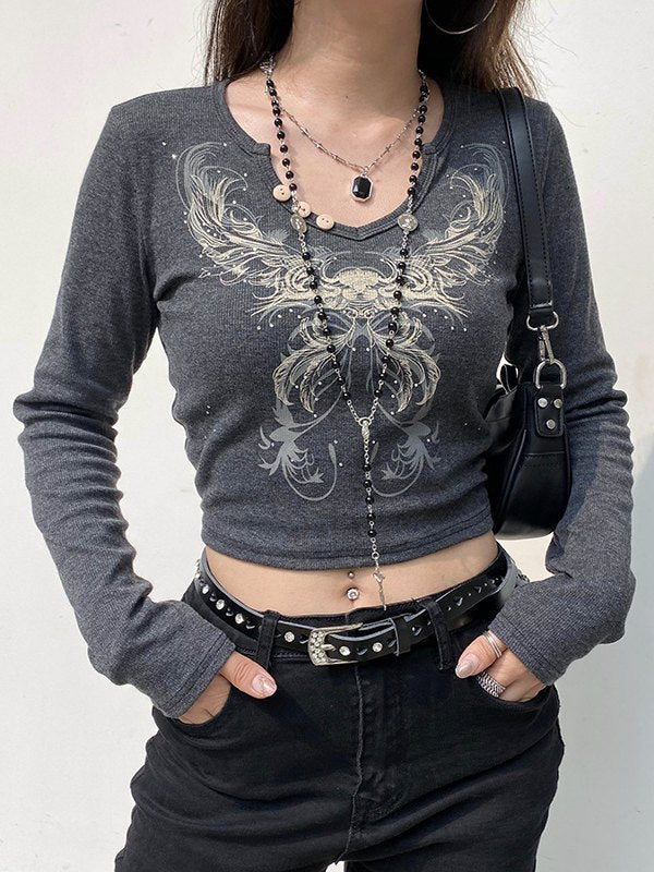 DARK LONG-SLEEVED CROP TOP WITH VINTAGE WING GRAPHIC DESIGN