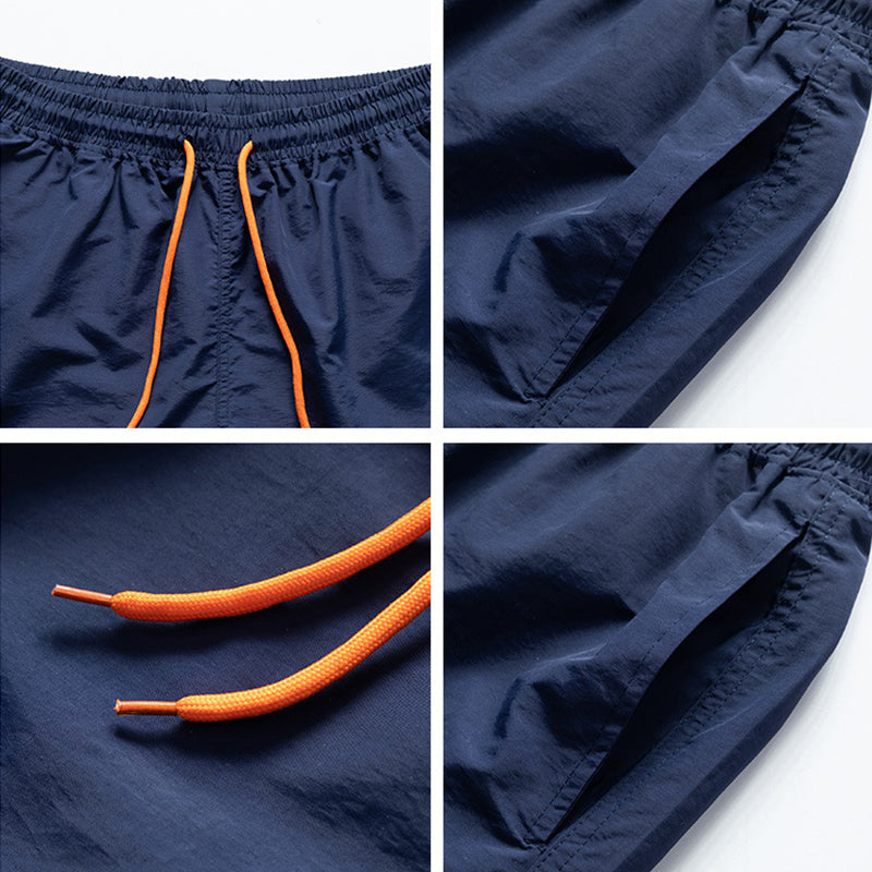 LIGHT BLUE SWIM TRUNKS WITH ORANGE DRAWSTRING