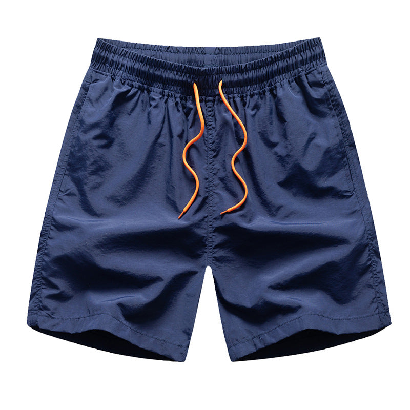 LIGHT BLUE SWIM TRUNKS WITH ORANGE DRAWSTRING
