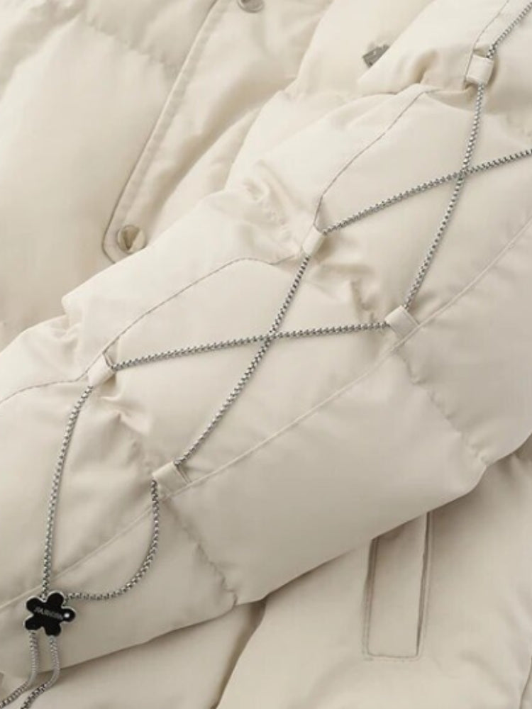 BLACK PUFFER JACKET WITH WHITE ACCENTS FOR COLD WEATHER WEAR