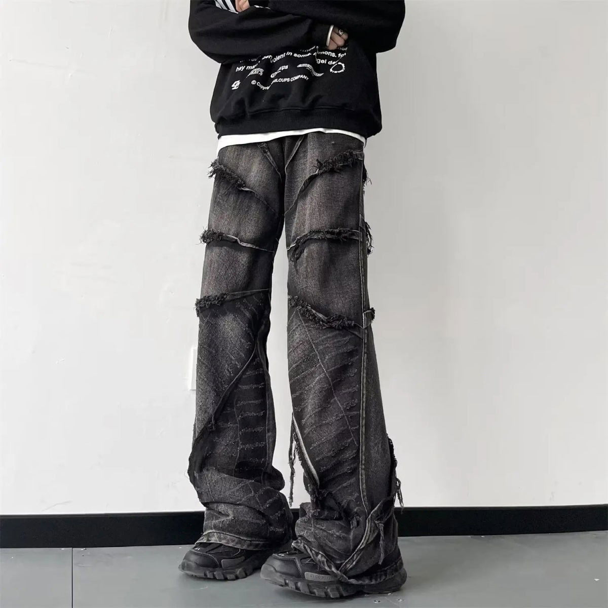 DISTRESSED BLACK PATCHWORK JEANS WITH PERFECT FIT FOR CAREFREE MOVEMENT