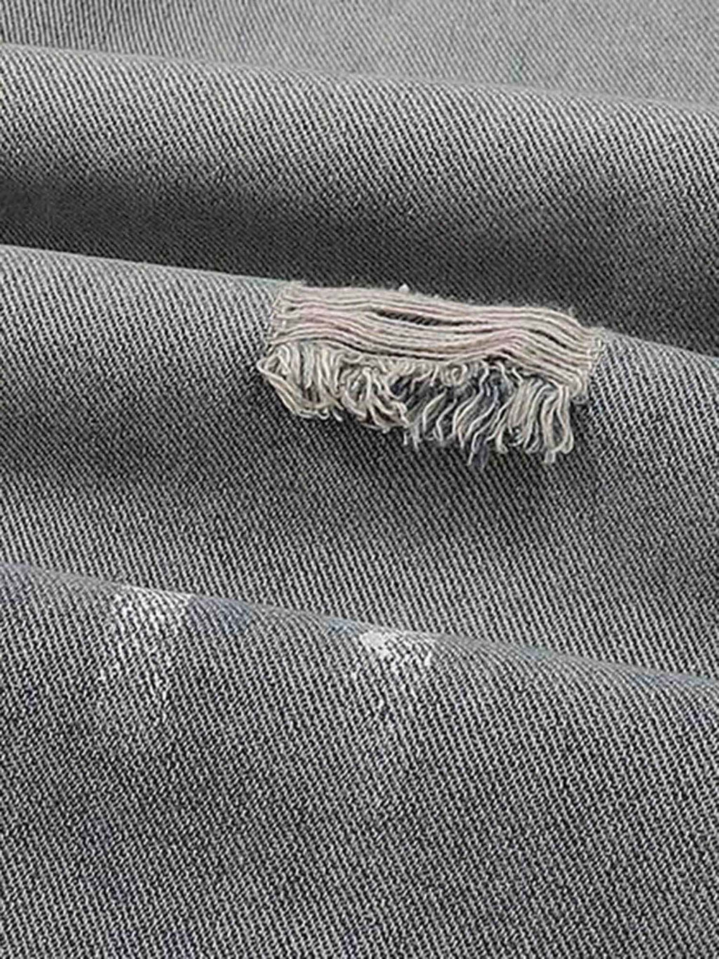 DISTRESSED DENIM PANTS WITH VINTAGE INK SPLASH DESIGN