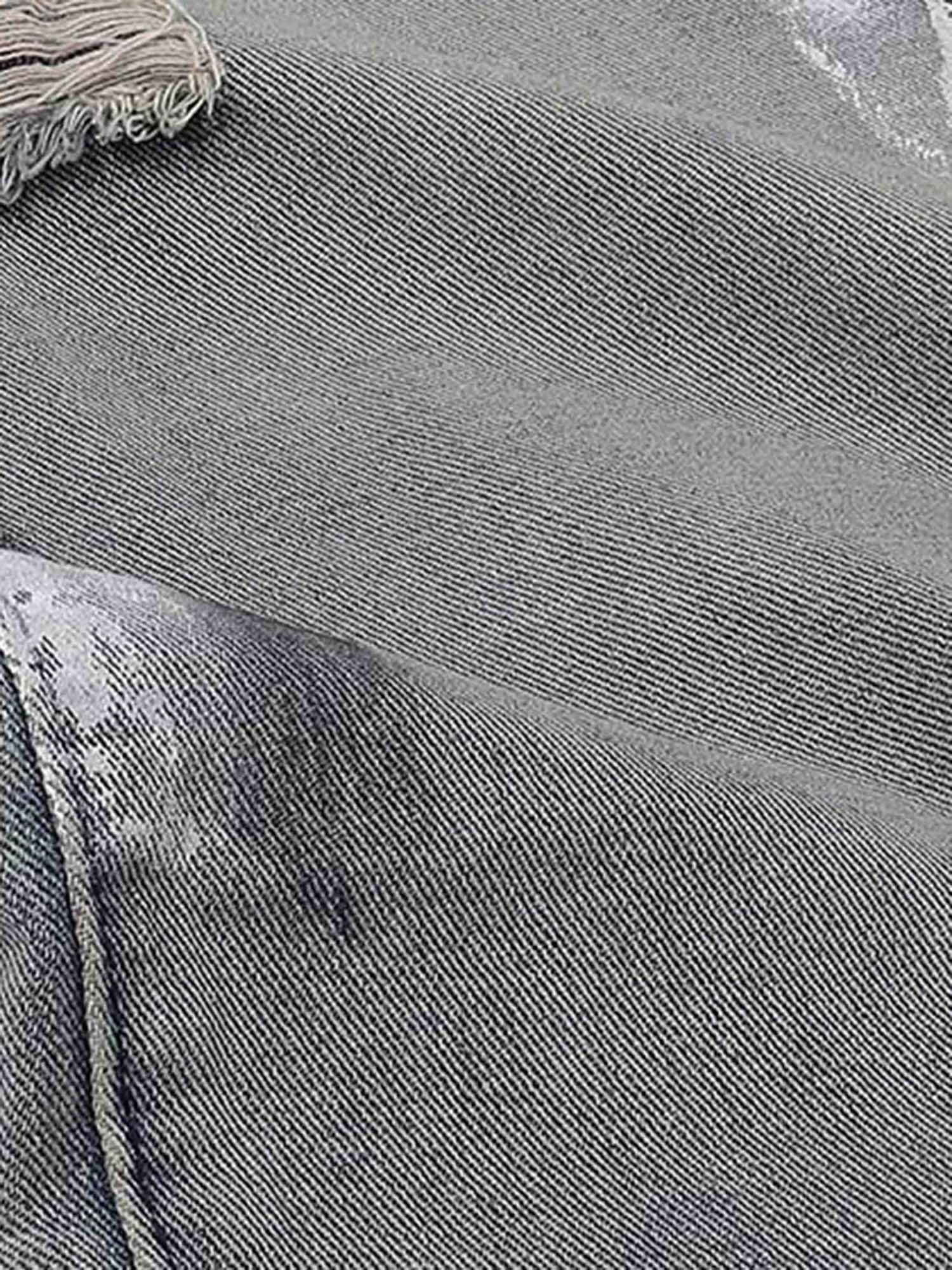 DISTRESSED DENIM PANTS WITH VINTAGE INK SPLASH DESIGN