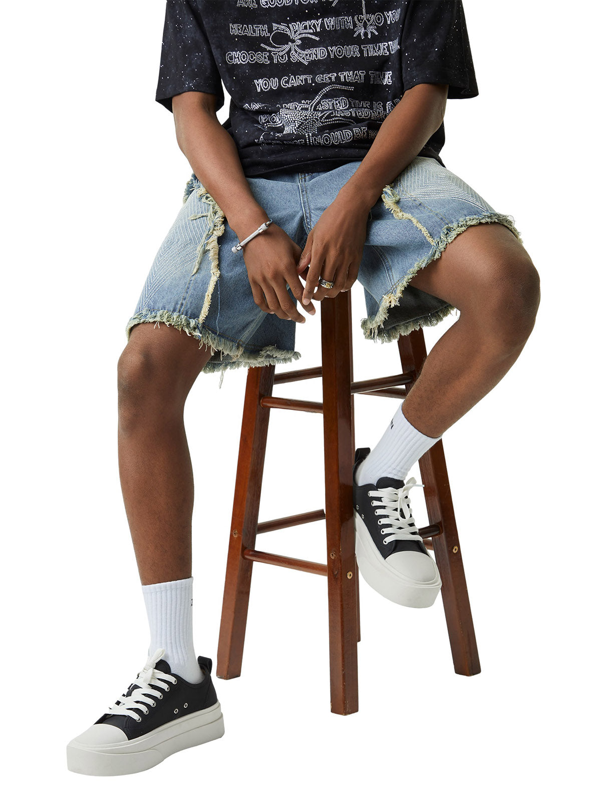 DISTRESSED DENIM SHORTS WITH EMBROIDERED DESIGN AND MID WAIST FIT