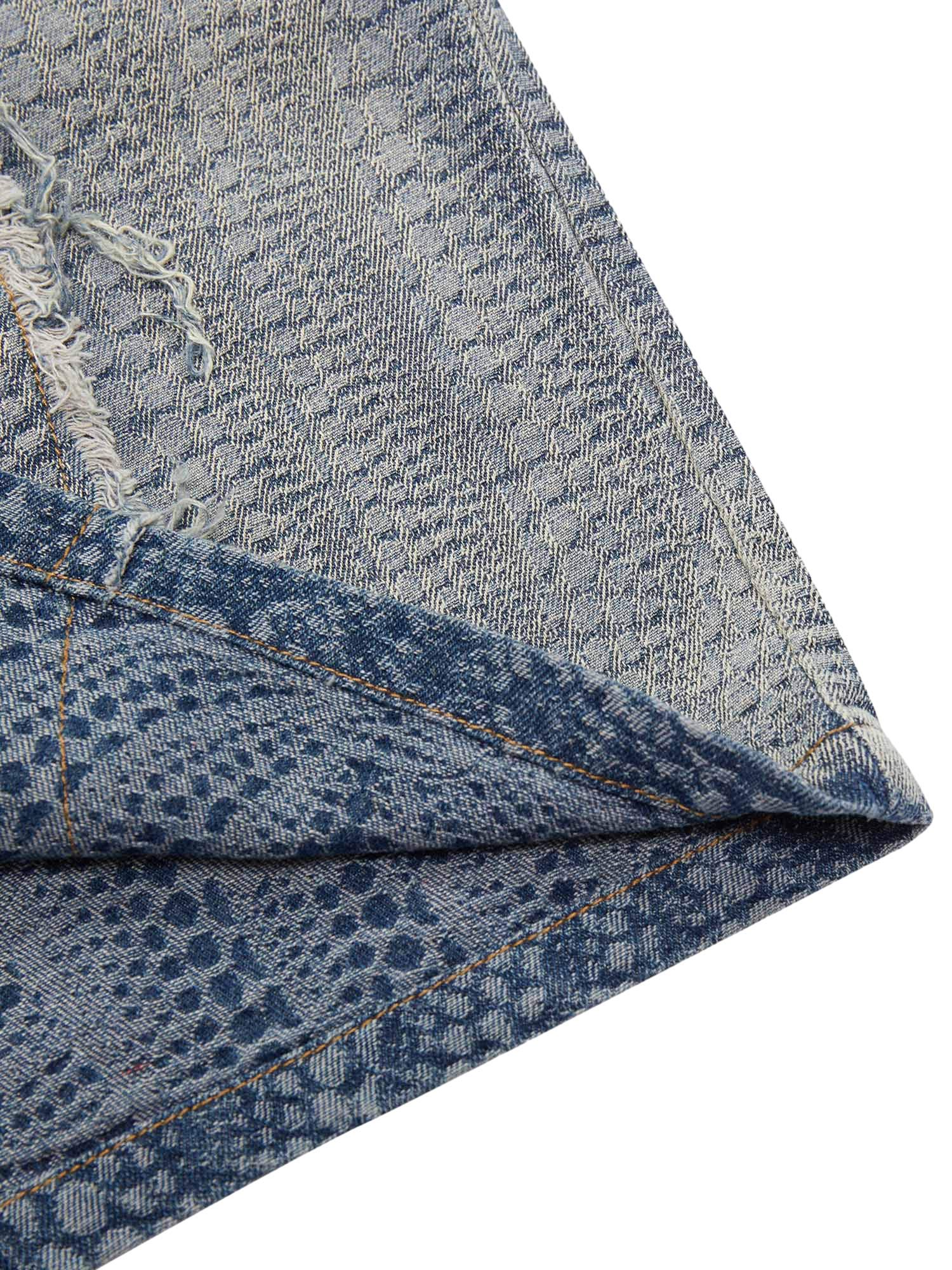 DISTRESSED DENIM ZIP-UP SHIRT WITH WASHED RAW EDGE DETAIL