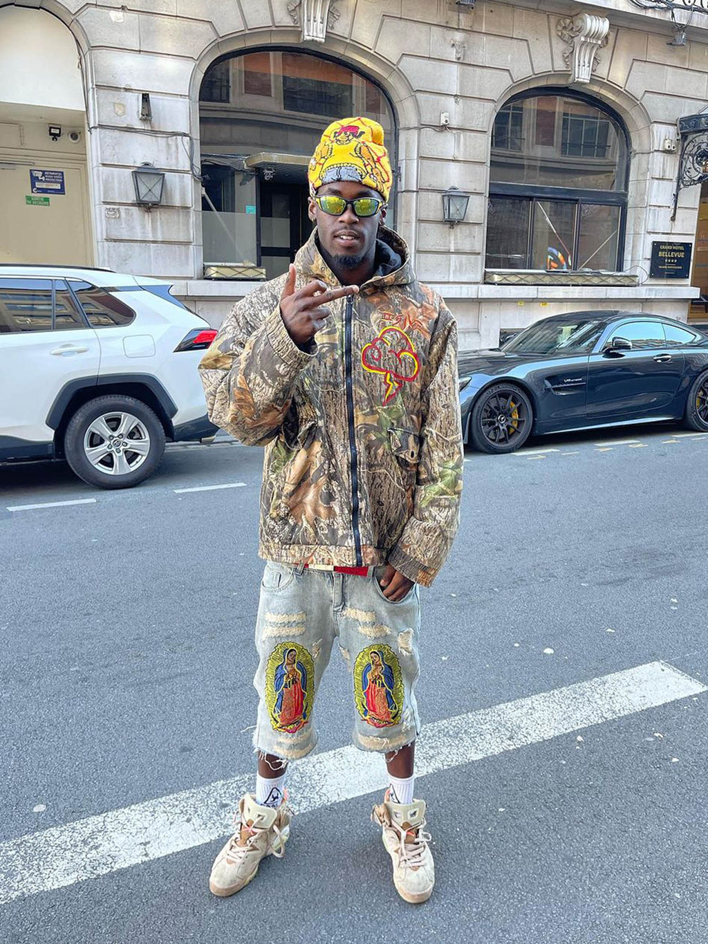 DISTRESSED GRAY JEANS WITH RELIGIOUS IMAGERY MID WAIST EMBROIDERED DETAIL