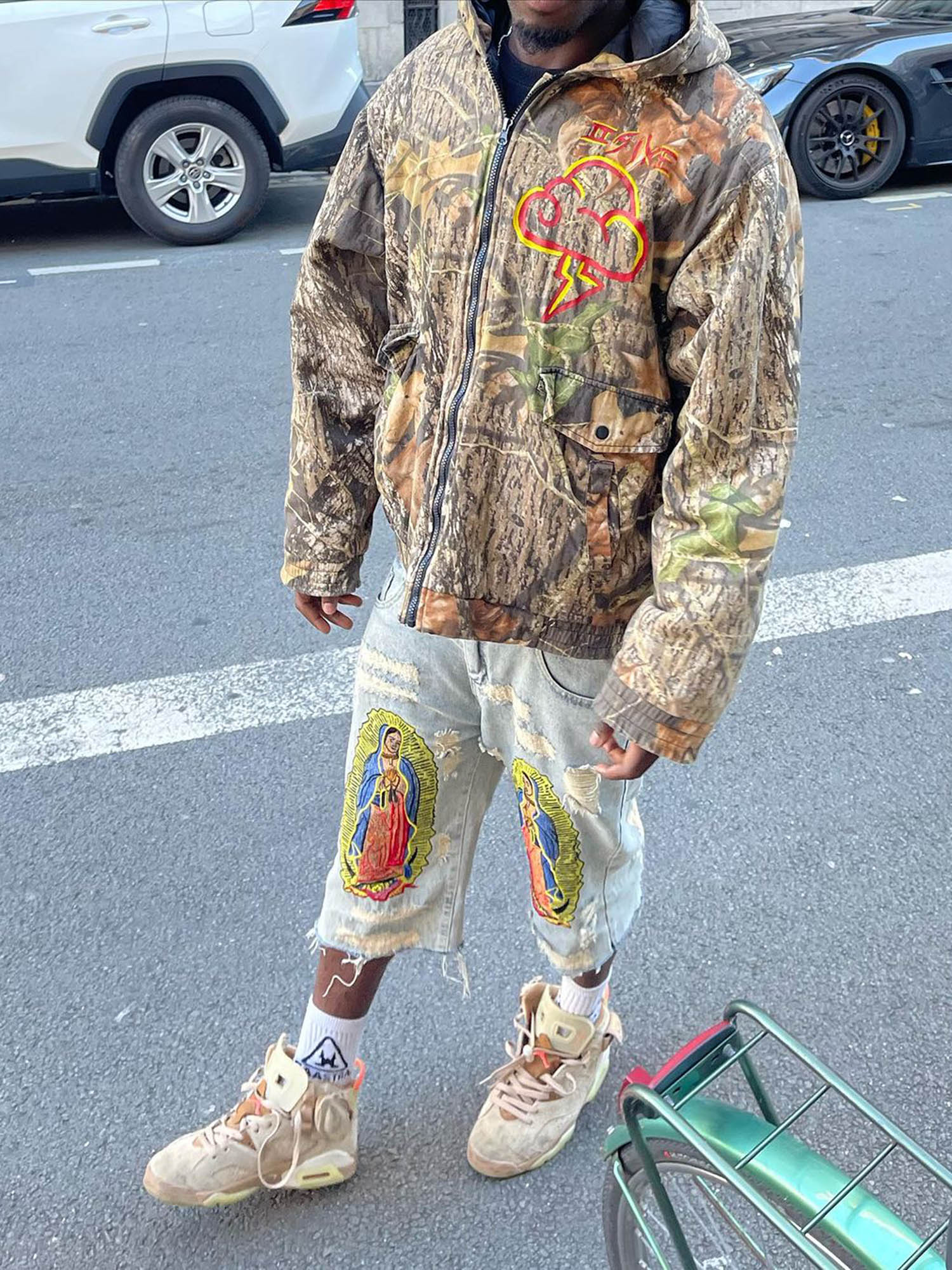 DISTRESSED GRAY JEANS WITH RELIGIOUS IMAGERY MID WAIST EMBROIDERED DETAIL