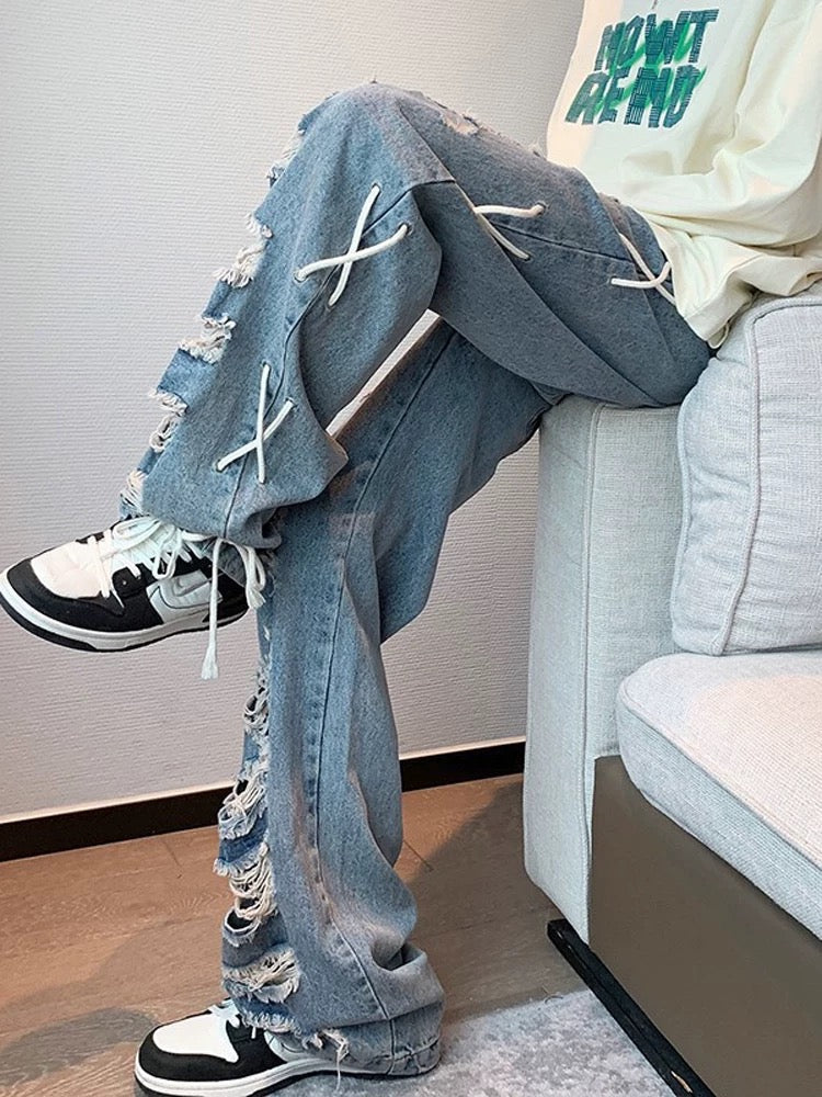 DISTRESSED LIGHT WASH STRAIGHT LEG JEANS WITH LACE-UP DETAILS