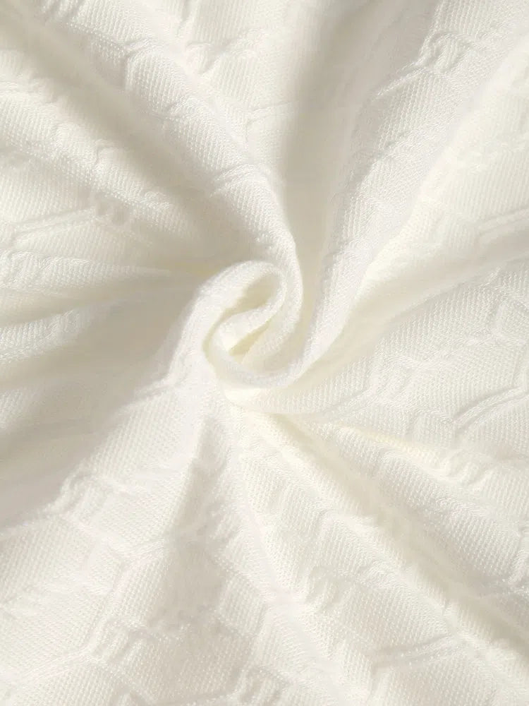 ELEGANT KNIT POLO SHIRT IN WHITE TEXTURED KNIT