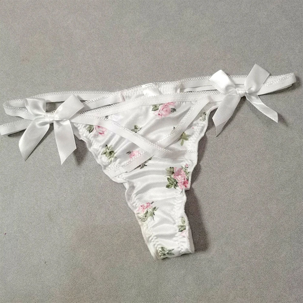 FLORAL PRINT THONG WITH PINK RIBBON ACCENTS