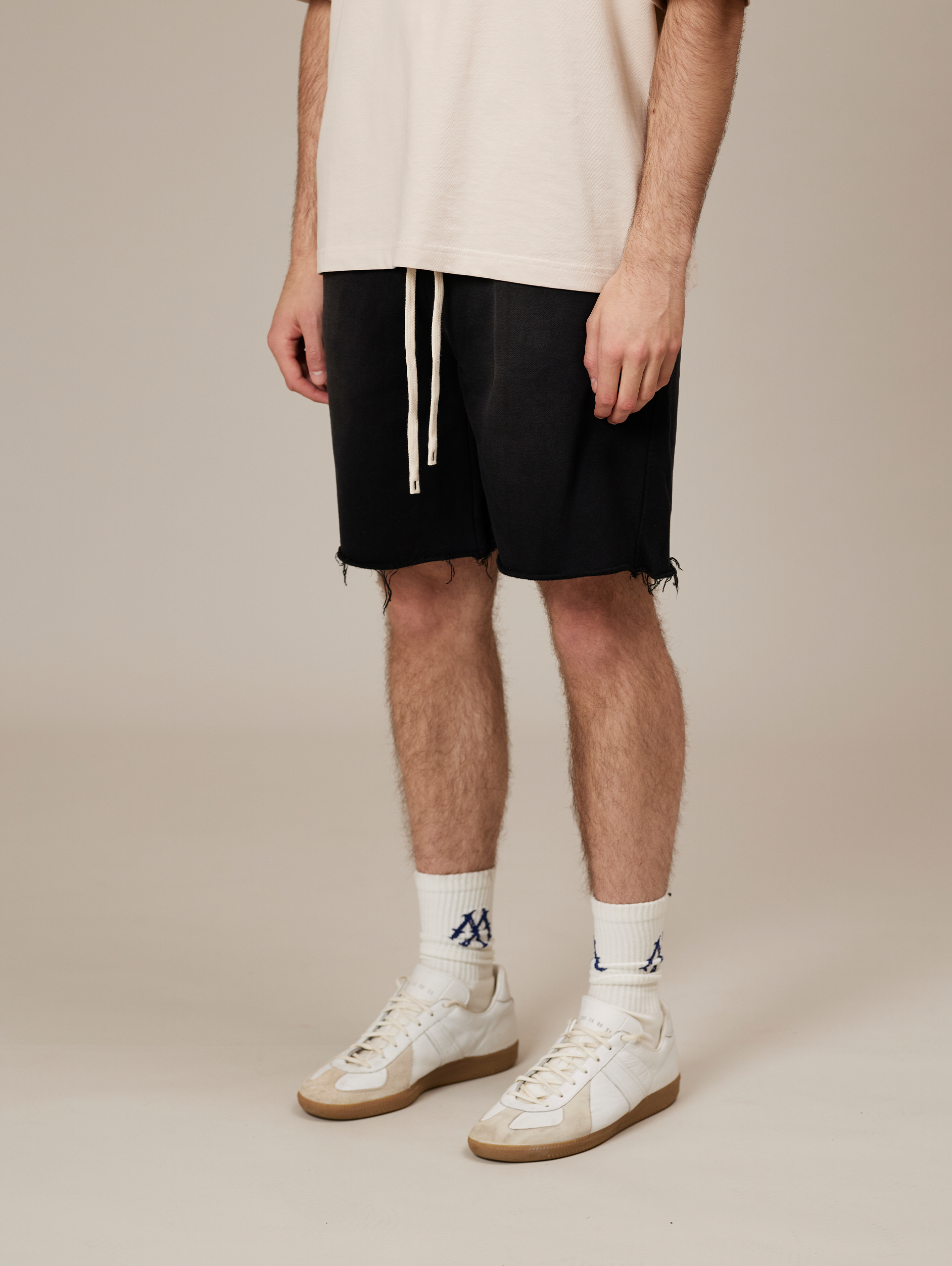 FRAYED-HEM BLACK DENIM SHORTS HANDMADE COTTON SUNFADED SPRAY BLACK