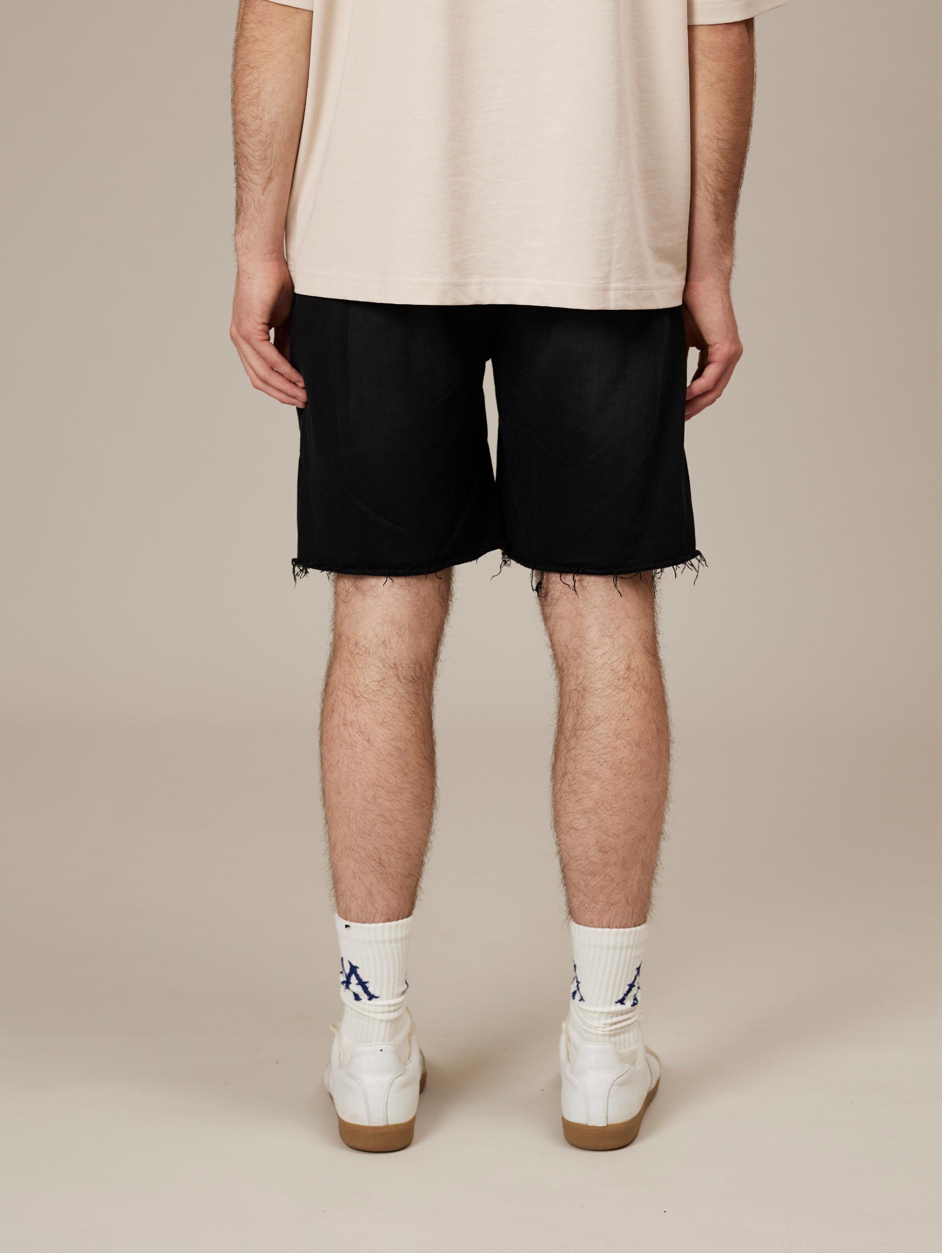 FRAYED-HEM BLACK DENIM SHORTS HANDMADE COTTON SUNFADED SPRAY BLACK