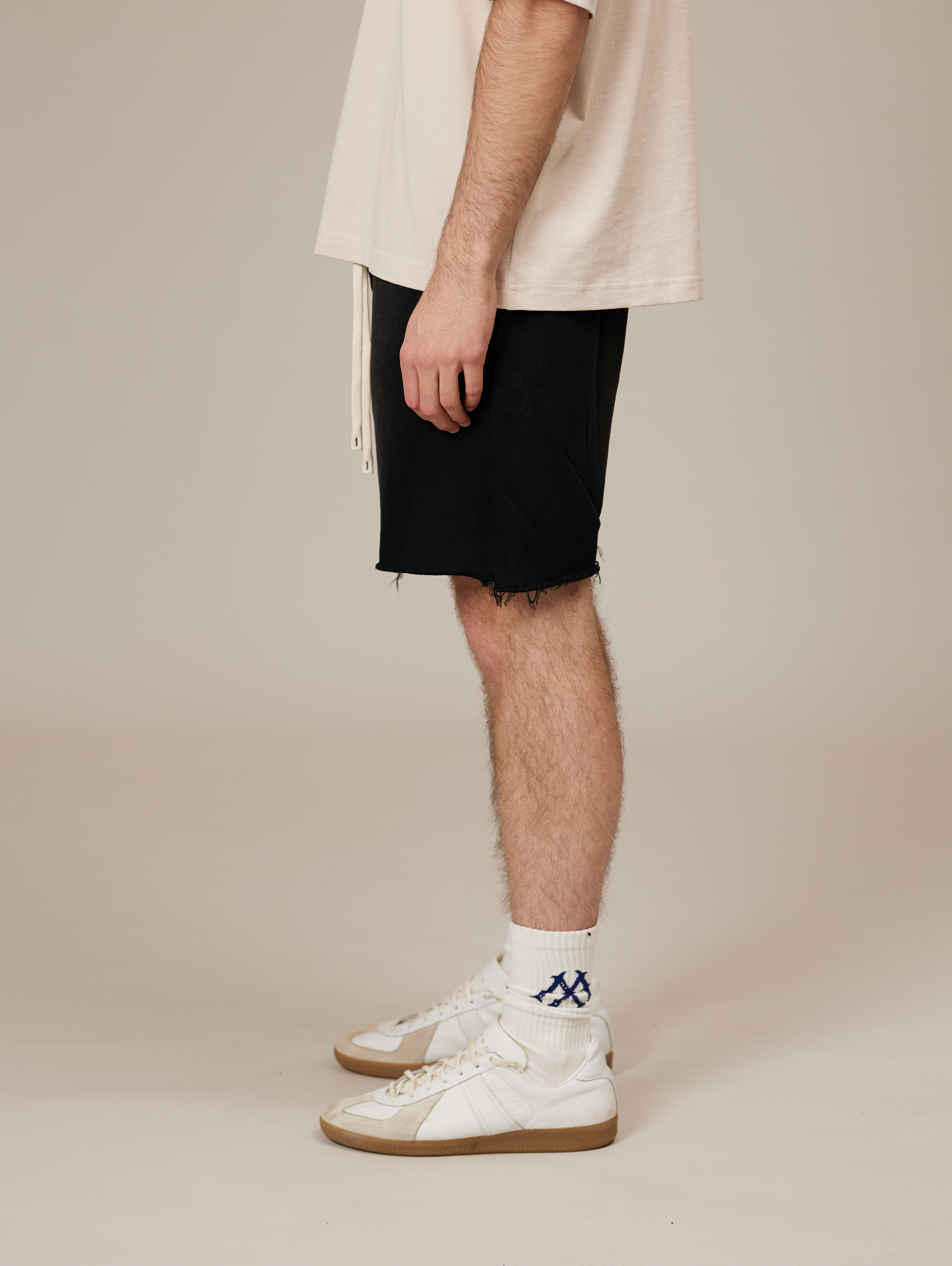 FRAYED-HEM BLACK DENIM SHORTS HANDMADE COTTON SUNFADED SPRAY BLACK