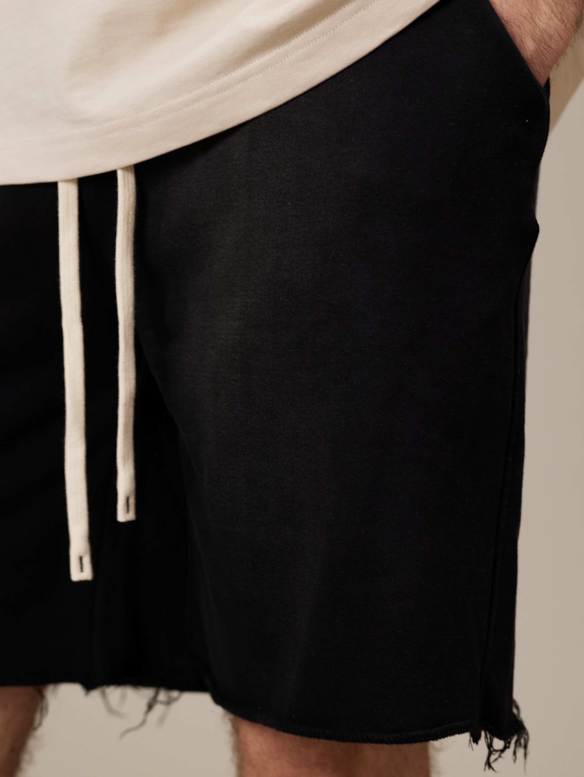 FRAYED-HEM BLACK DENIM SHORTS HANDMADE COTTON SUNFADED SPRAY BLACK