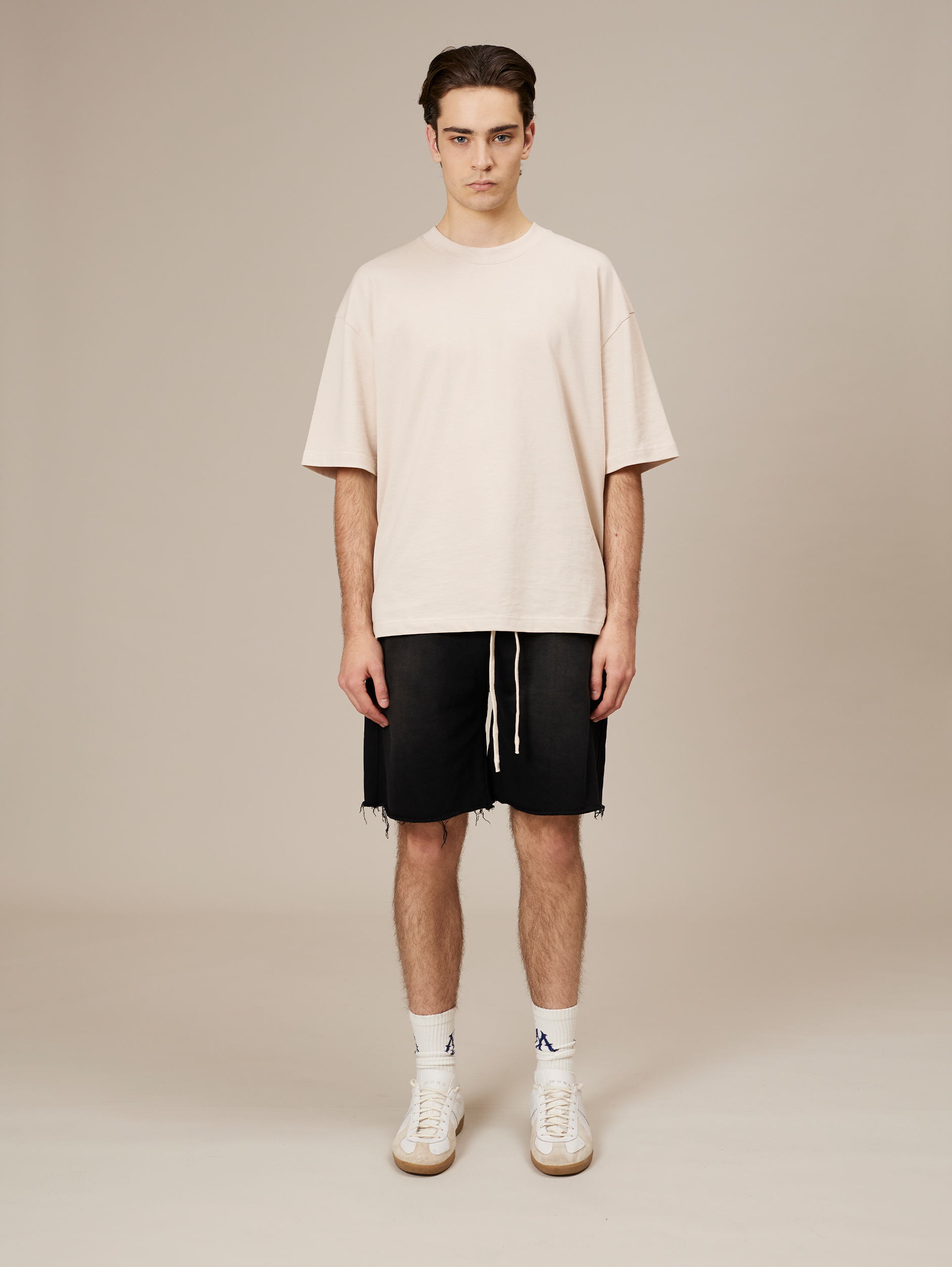 FRAYED-HEM BLACK DENIM SHORTS HANDMADE COTTON SUNFADED SPRAY BLACK