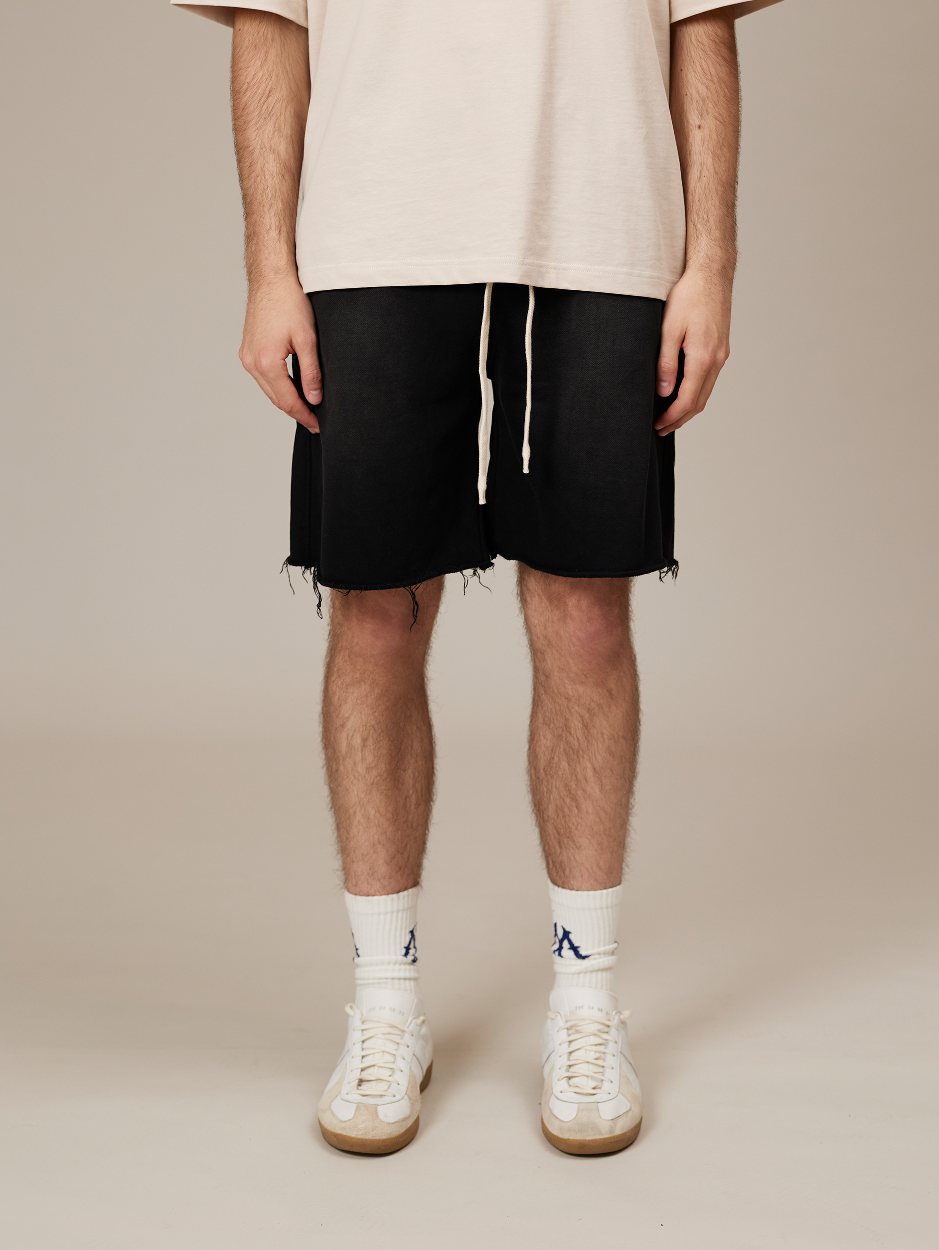 FRAYED-HEM BLACK DENIM SHORTS HANDMADE COTTON SUNFADED SPRAY BLACK