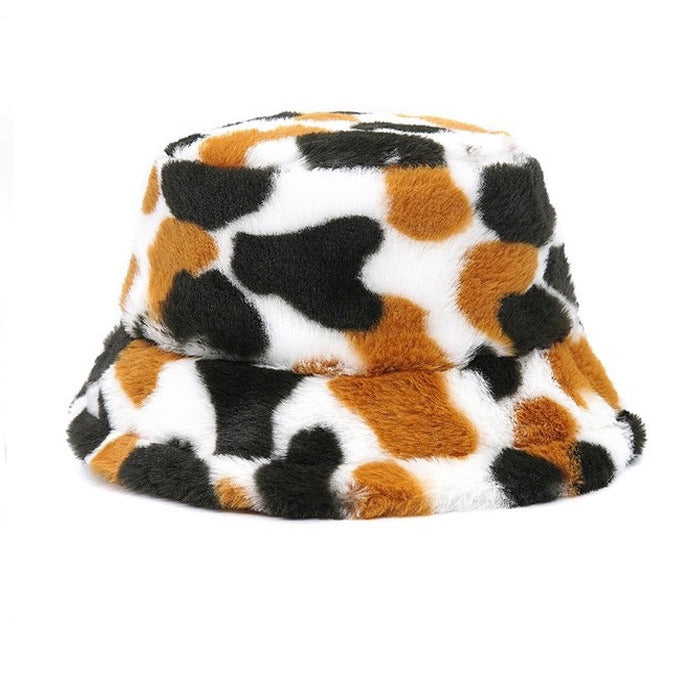 FUZZY BUCKET HAT WITH BLACK, BROWN, AND WHITE SPOTS