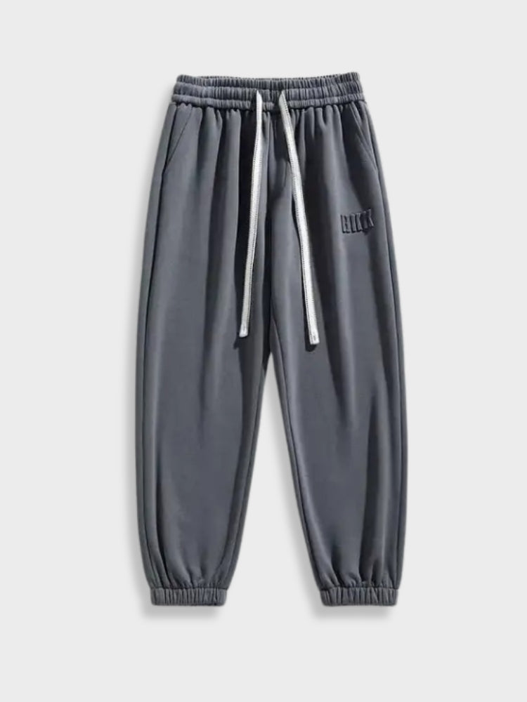 GRAY DRAWSTRING SWEATPANTS WITH ADJUSTABLE FIT AND DRAWSTRING HEM