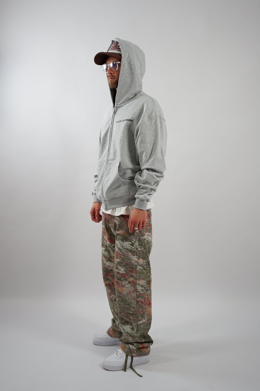 GRAY OVERSIZED ZIPPER HOODIE WITH TEXT ON BACK