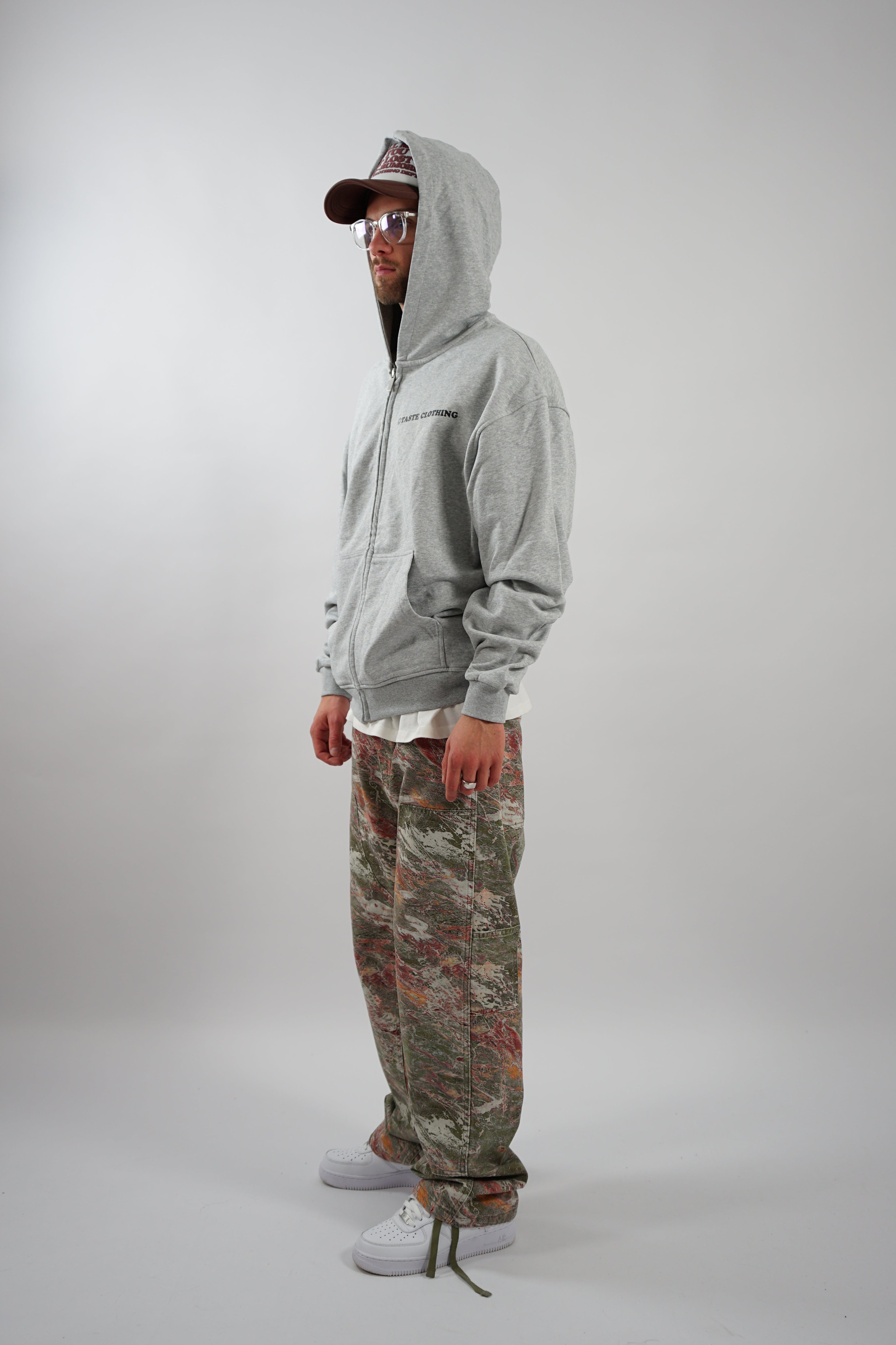 GRAY OVERSIZED ZIPPER HOODIE WITH TEXT ON BACK