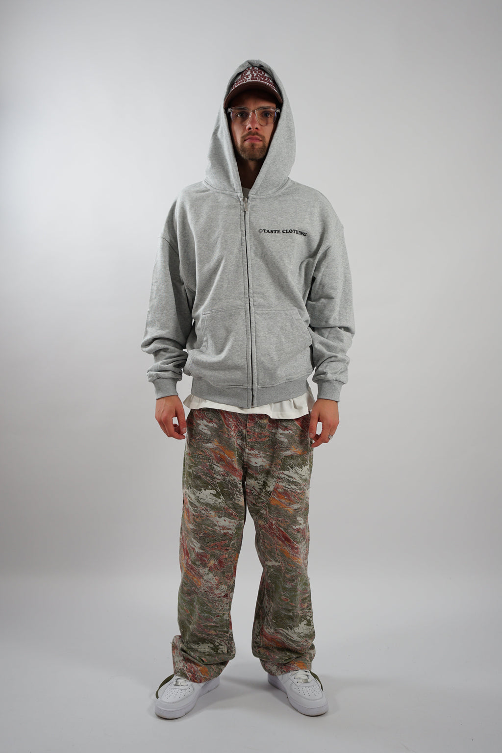 GRAY OVERSIZED ZIPPER HOODIE WITH TEXT ON BACK