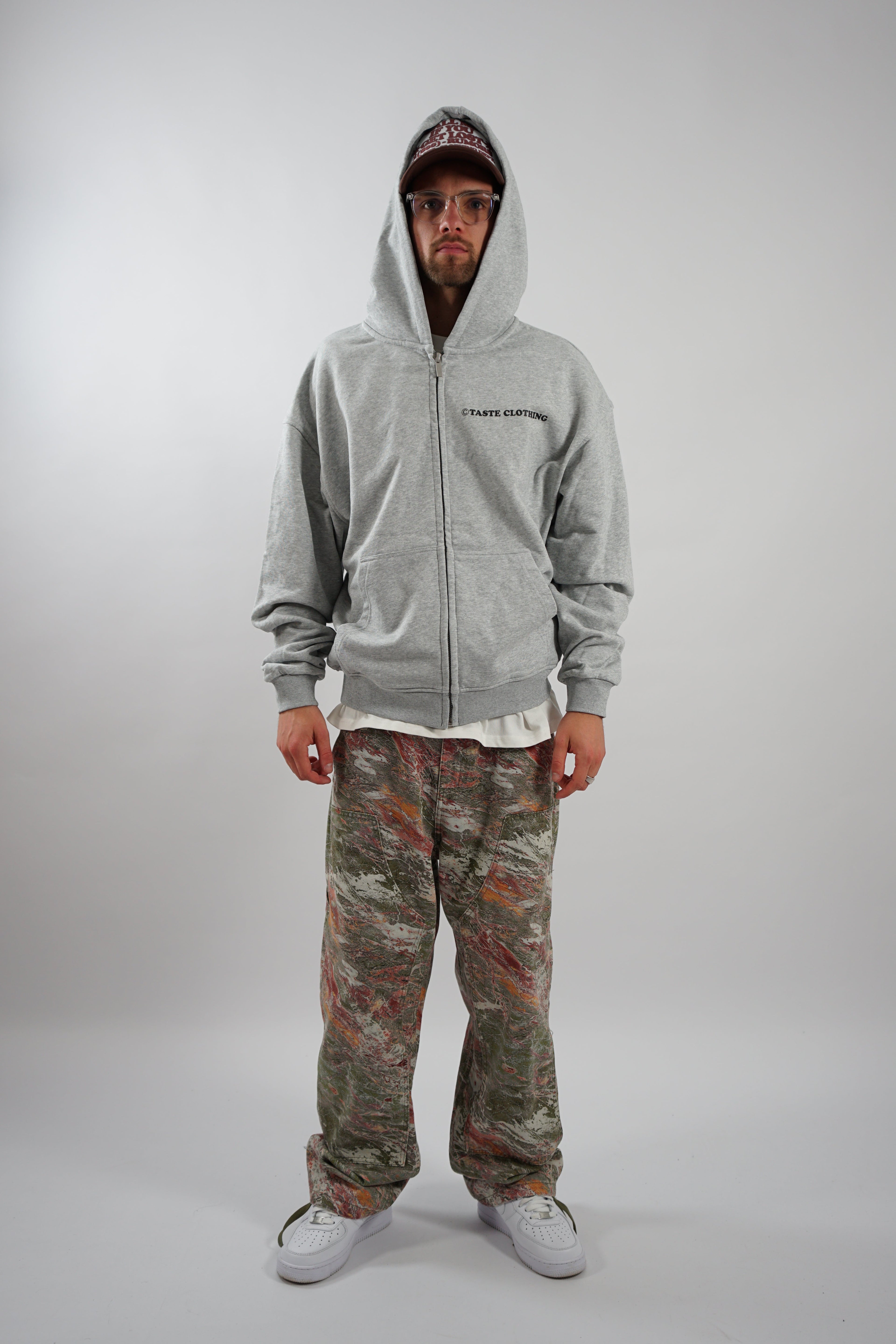 GRAY OVERSIZED ZIPPER HOODIE WITH TEXT ON BACK