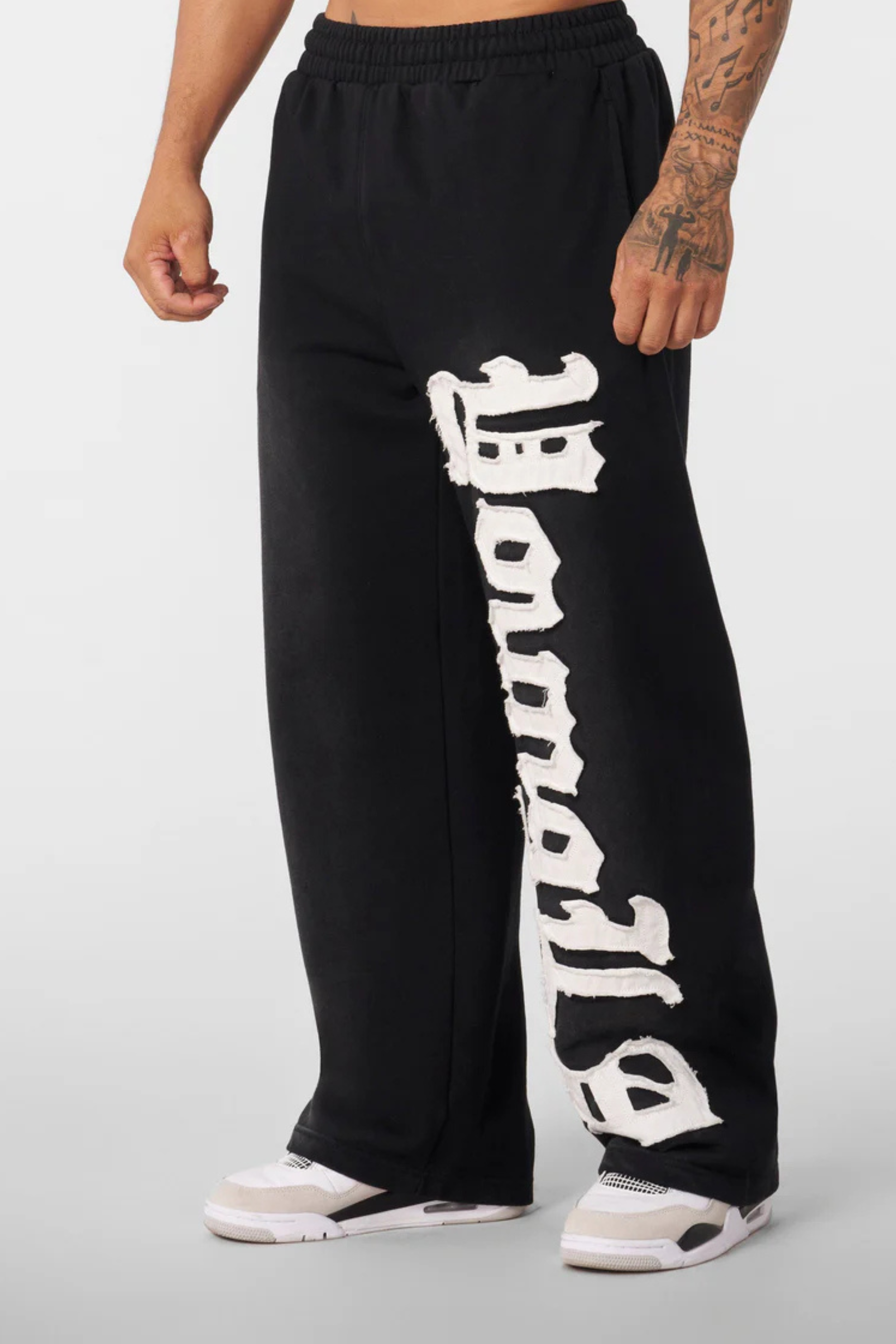 GRAY UNISEX SWEATPANTS WITH WHITE LETTERING FOR ULTIMATE COMFORT