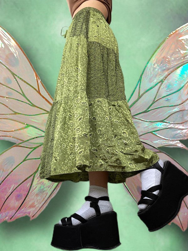 GREEN TIERED FLORAL MAXI SKIRT WITH DRAWSTRING WAIST AND PATCHWORK DESIGN