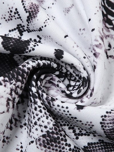 HALTER MINIDRESS - SNAKESKIN PRINT WITH WILD ELEGANCE AND PUNK FLAIR