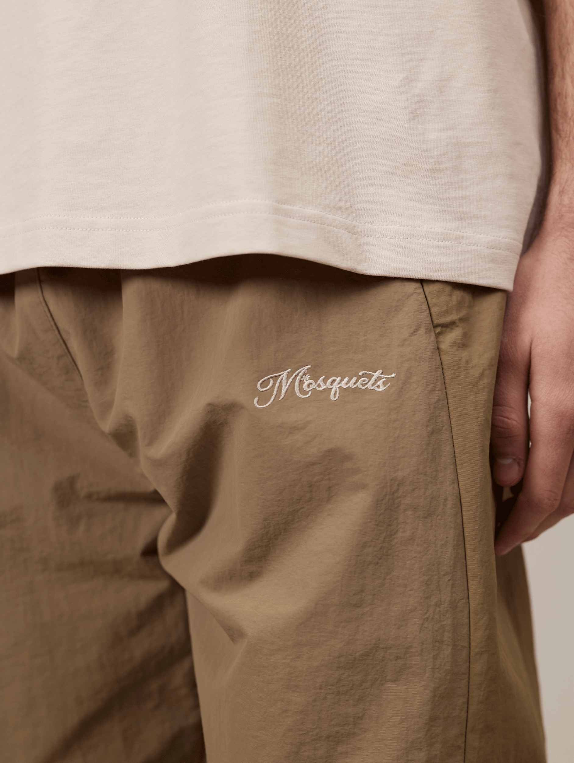 KHAKI TRACK PANTS WITH BEIGE CONTRAST CRINKLE DETAIL