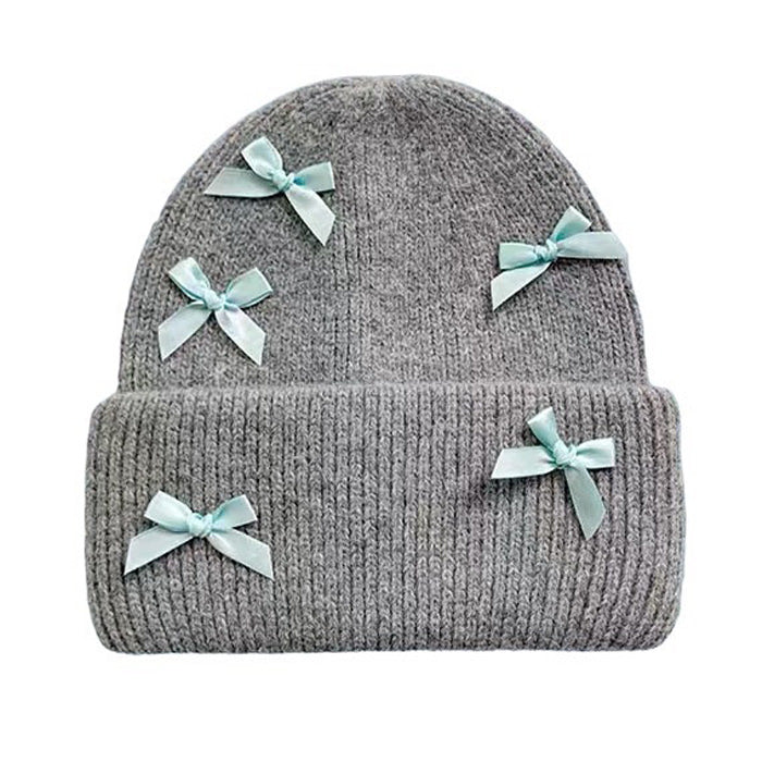 LIGHT BLUE KNIT BEANIE WITH PINK BOWS FOR WOMEN AND GIRLS