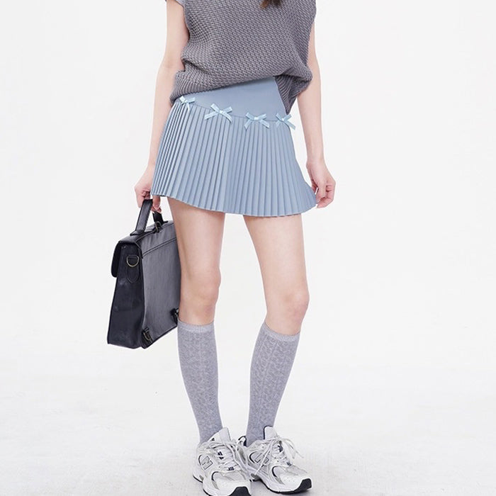 LIGHT BLUE PLEATED MINI SKIRT WITH PLAYFUL BOWS