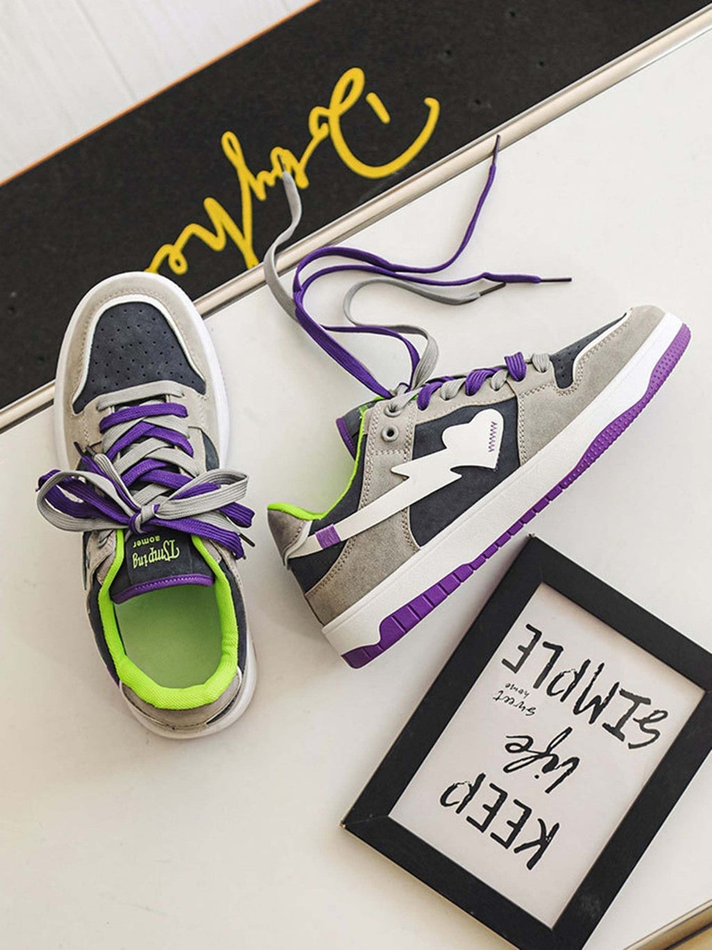 LOW-TOP SNEAKERS WITH PURPLE ACCENTS AND RUBBER OUTSOLE