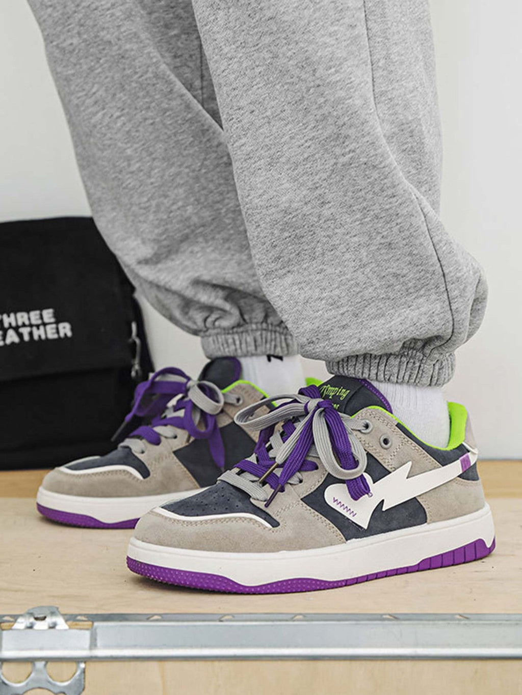 LOW-TOP SNEAKERS WITH PURPLE ACCENTS AND RUBBER OUTSOLE