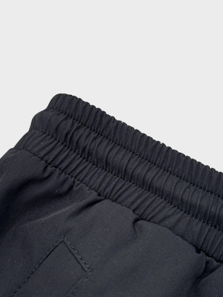 ATHLETIC PANTS WITH ZIPPERED POCKETS