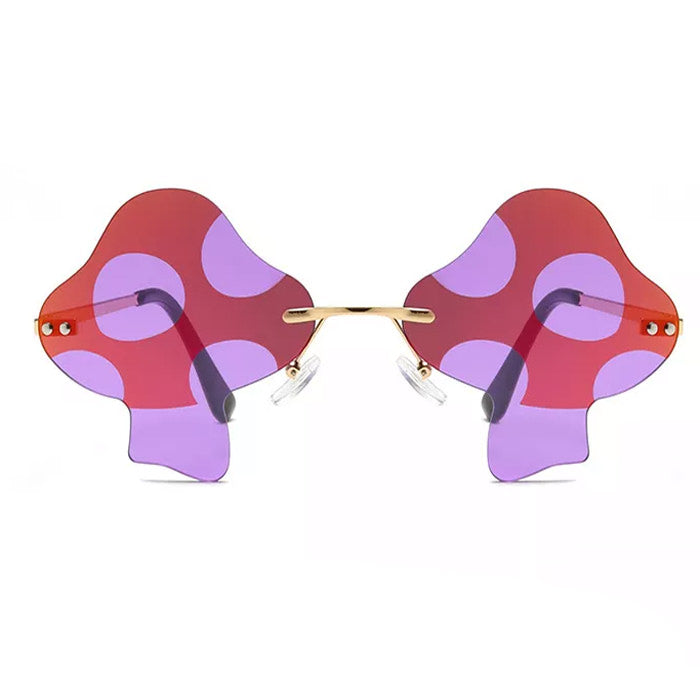 MUSHROOM-SHAPED SUNGLASSES WITH RED LENSES AND PURPLE POLKA DOTS