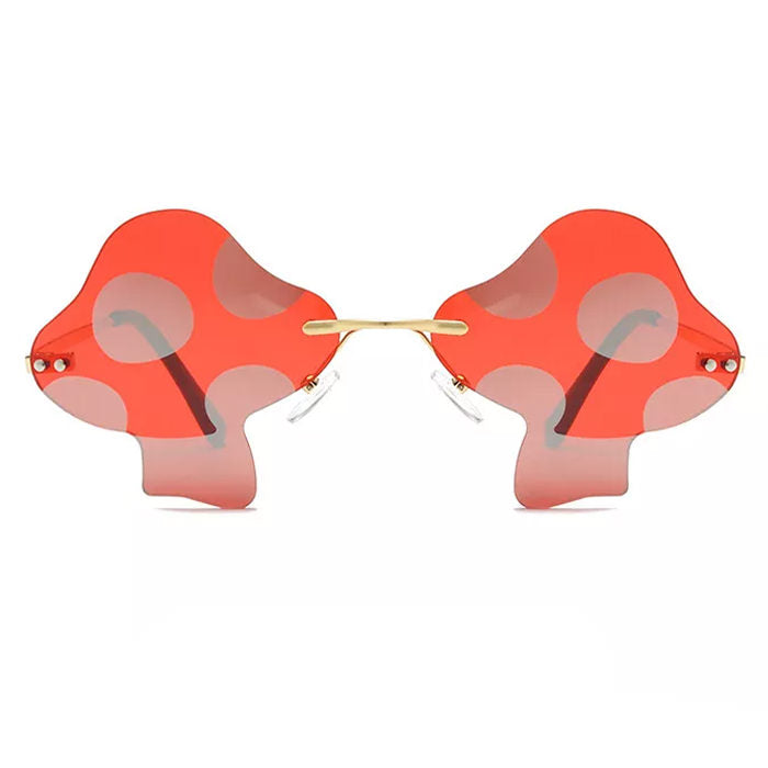 MUSHROOM-SHAPED SUNGLASSES WITH RED LENSES AND PURPLE POLKA DOTS