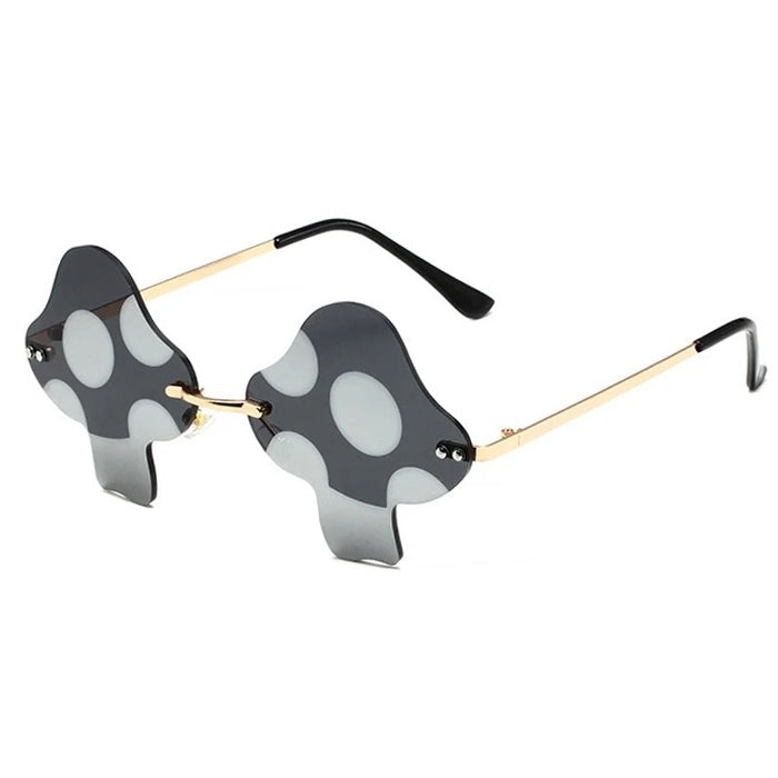 MUSHROOM-SHAPED SUNGLASSES WITH RED LENSES AND PURPLE POLKA DOTS