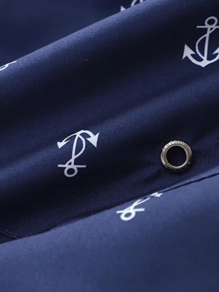 NAVY BLUE ANCHOR-PATTERNED SWIM TRUNKS WITH COMFORTABLE STRETCH FIT